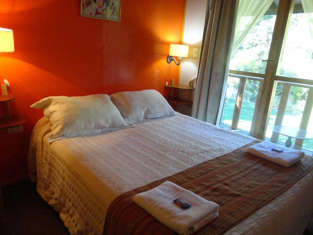 Cabanas Spa Bungalows Huarranchi Пукон Номер фото